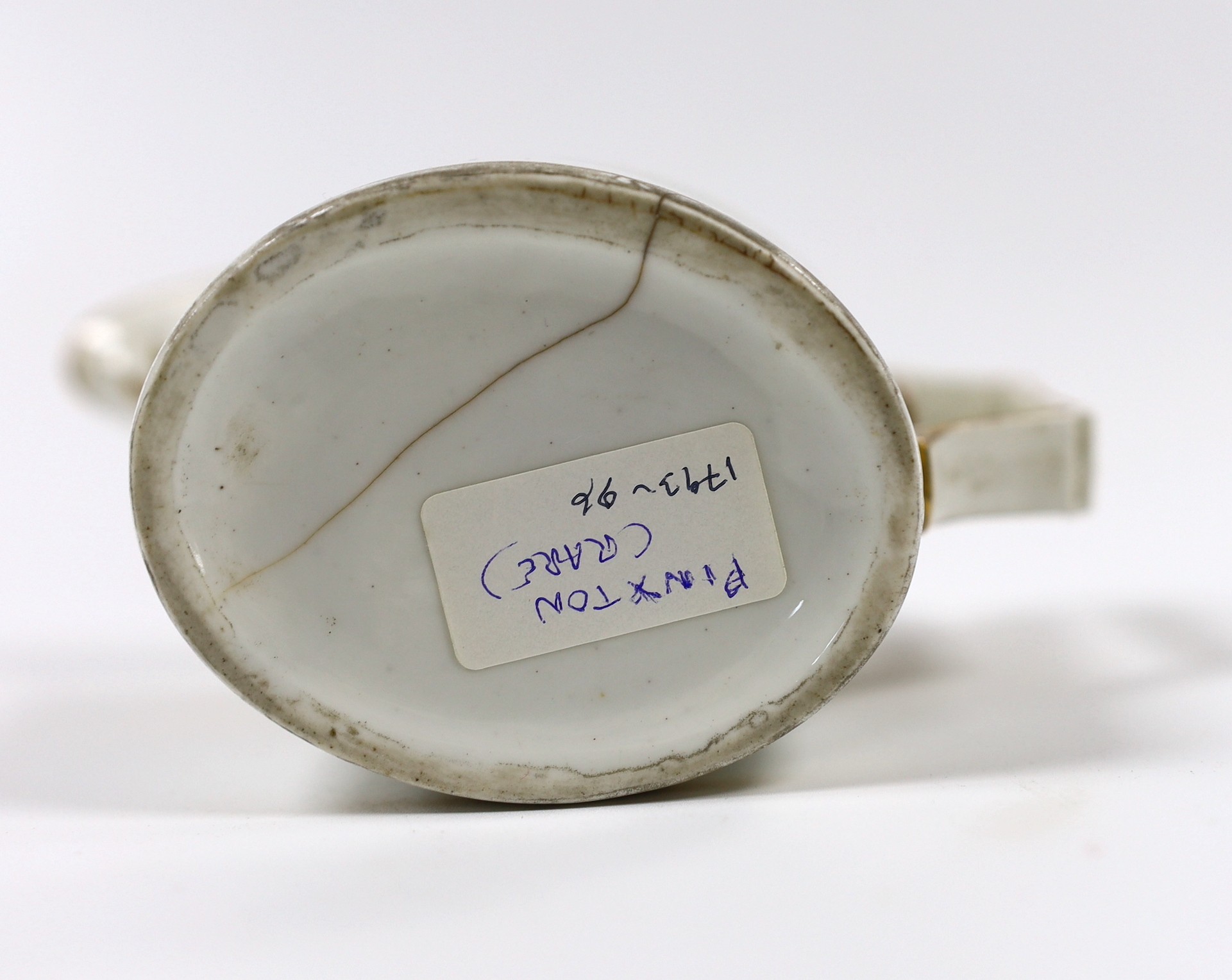 An 18th century rare Pinxton oval milk jug, cracked